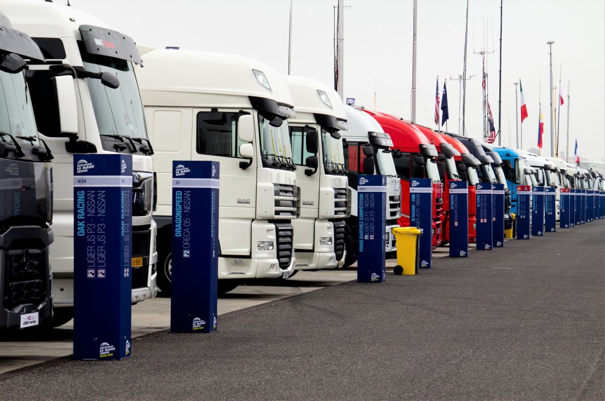 Fleet of delivery trucks ready for dispatch